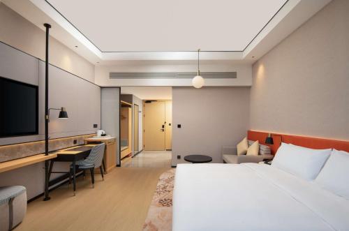 Imagen de la habitación del Hotel Hilton Garden Inn Xuzhou Pengcheng Square. Foto 16