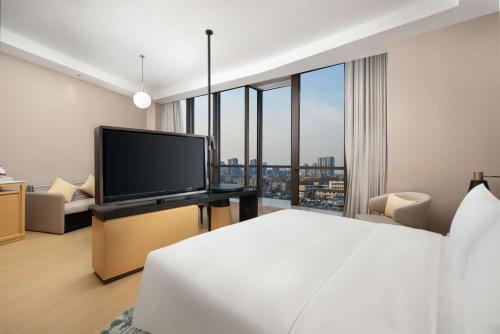 Imagen de la habitación del Hotel Hilton Garden Inn Xuzhou Pengcheng Square. Foto 17
