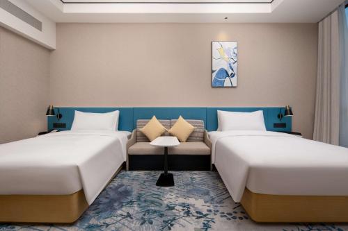 Imagen de la habitación del Hotel Hilton Garden Inn Xuzhou Pengcheng Square. Foto 18