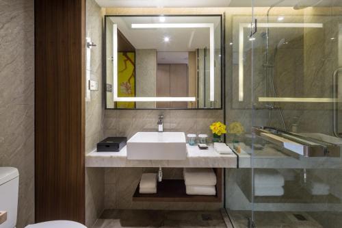 Imagen de la habitación del Hotel Hilton Garden Inn Zhongshan Guzhen. Foto 7
