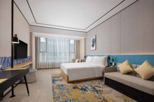 Imagen de la habitación del Hotel Hilton Garden Inn Zhoukou Huaiyang. Foto 15
