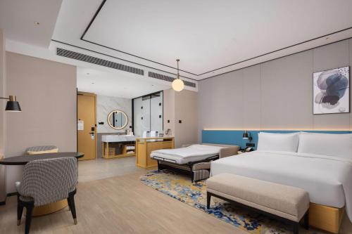 Imagen de la habitación del Hotel Hilton Garden Inn Zhoukou Huaiyang. Foto 16