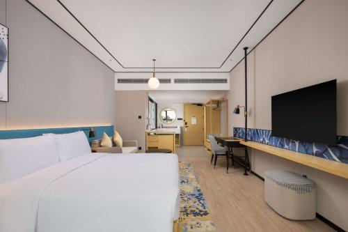 Imagen de la habitación del Hotel Hilton Garden Inn Zhoukou Huaiyang. Foto 18