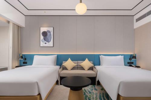 Imagen de la habitación del Hotel Hilton Garden Inn Zhoukou Huaiyang. Foto 20