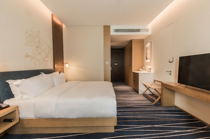 Imagen de la habitación del Hotel Hilton Garden Inn Zibo Zhangdian. Foto 18