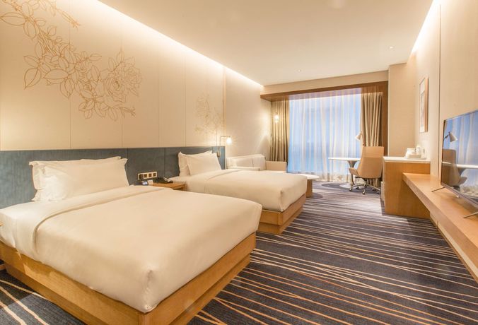 Imagen de la habitación del Hotel Hilton Garden Inn Zibo Zhangdian. Foto 14