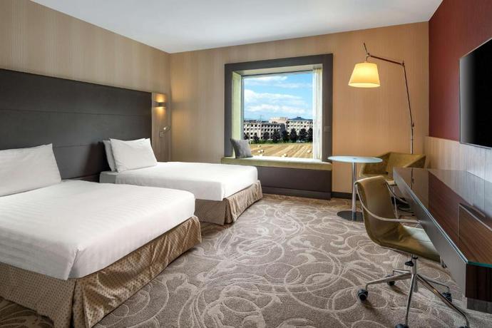 Imagen de la habitación del Hotel Hilton Geneva and Conference Centre. Foto 8