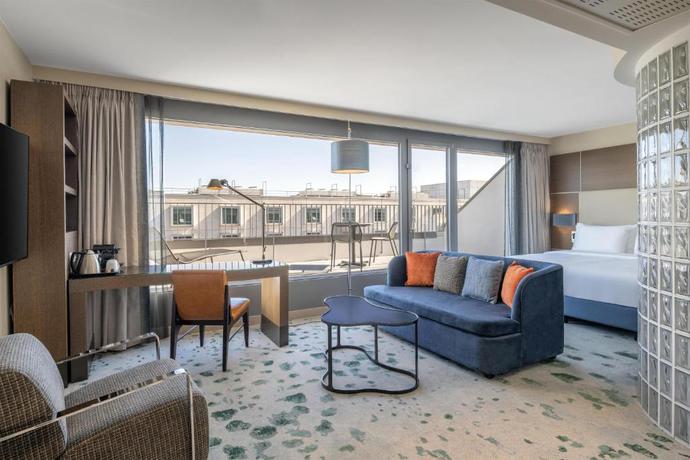 Imagen de la habitación del Hotel Hilton Geneva and Conference Centre. Foto 10