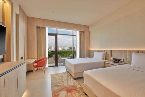 Imagen de la habitación del Hotel Hilton Gurugram Baani City Centre. Foto 15