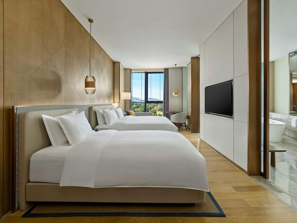 Imagen de la habitación del Hotel Hilton Hainan Ocean Flower Island. Foto 20