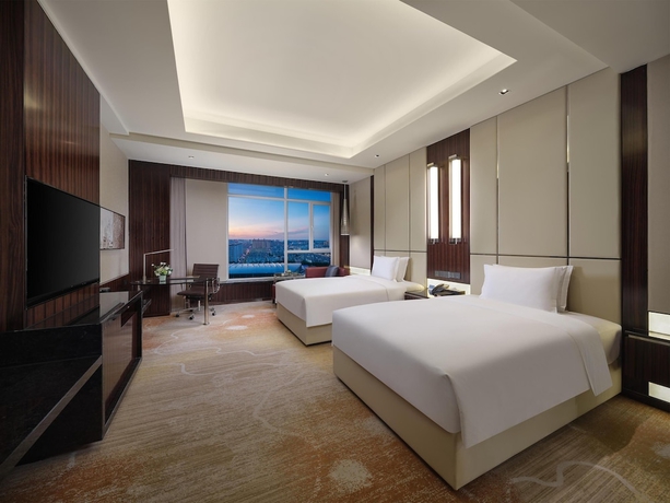 Imagen de la habitación del Hotel Hilton Harbin Exhibition Center. Foto 6