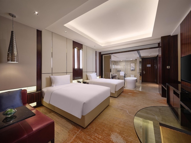 Imagen de la habitación del Hotel Hilton Harbin Exhibition Center. Foto 7