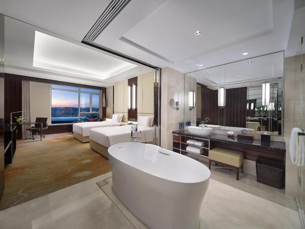 Imagen de la habitación del Hotel Hilton Harbin Exhibition Center. Foto 10