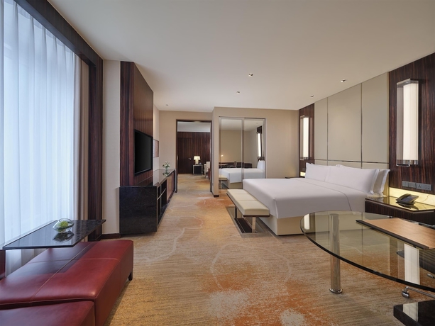 Imagen de la habitación del Hotel Hilton Harbin Exhibition Center. Foto 11
