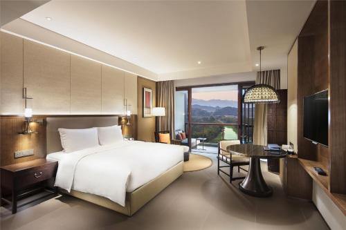 Imagen de la habitación del Hotel Hilton Huizhou Longmen Resort. Foto 7