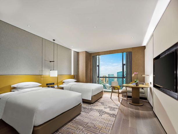Imagen de la habitación del Hotel Hilton Jiaxing. Foto 13