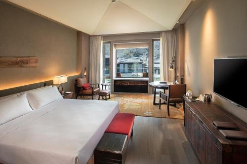 Imagen de la habitación del Hotel Hilton Jiuzhaigou Resort. Foto 8