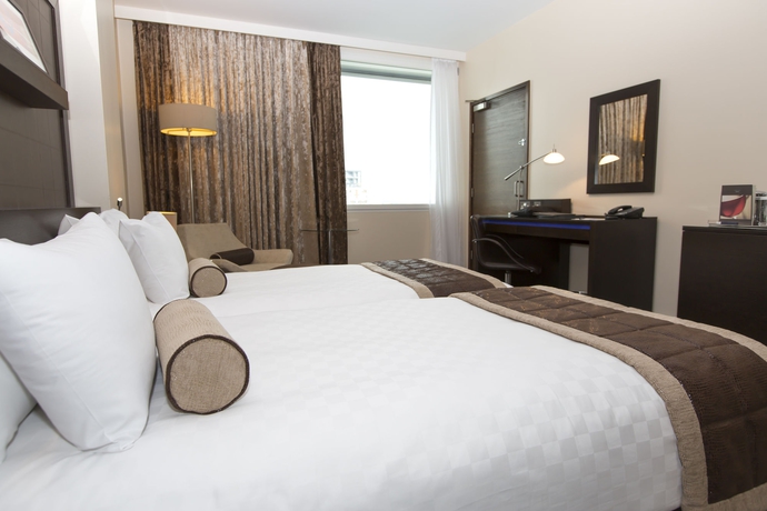 Imagen de la habitación del Hotel Hilton London Canary Wharf. Foto 8