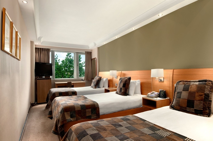 Imagen de la habitación del Hotel Hilton London Metropole. Foto 10