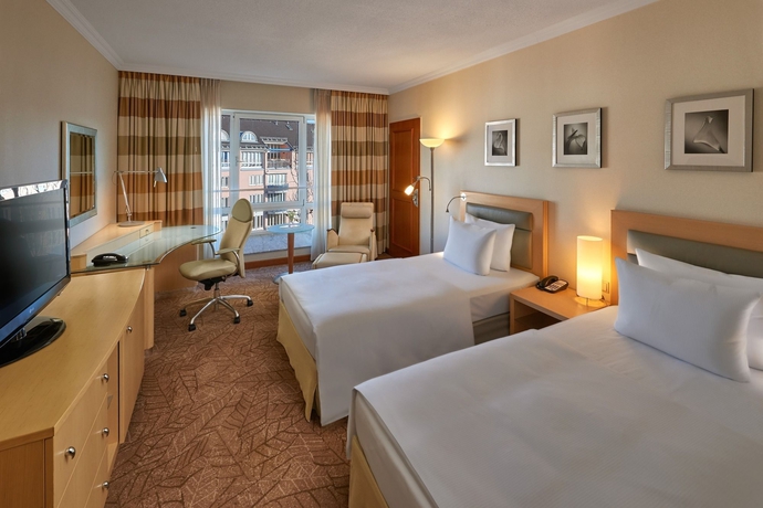 Imagen de la habitación del Hotel Hilton Munich City. Foto 9