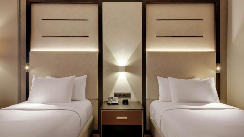 Imagen de la habitación del Hotel Hilton Munich City. Foto 16