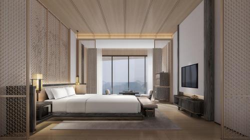 Imagen de la habitación del Hotel Hilton Nanjing Niushoushan. Foto 16