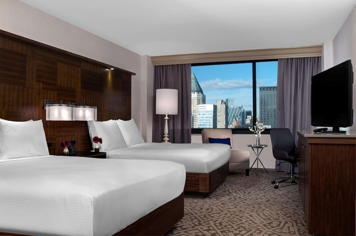 Imagen de la habitación del Hotel Hilton New York Times Square. Foto 10