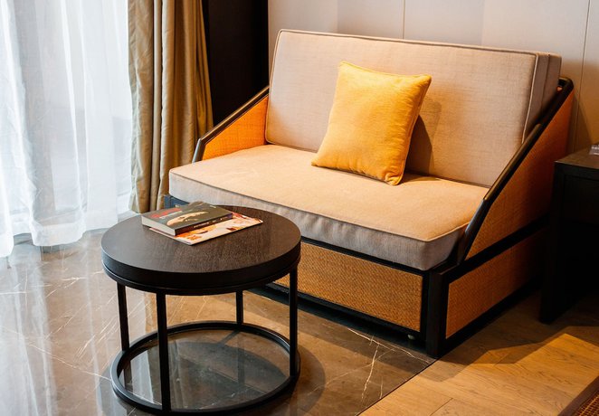 Imagen de la habitación del Hotel Hilton Ningbo Dongqian Lake Resort. Foto 11