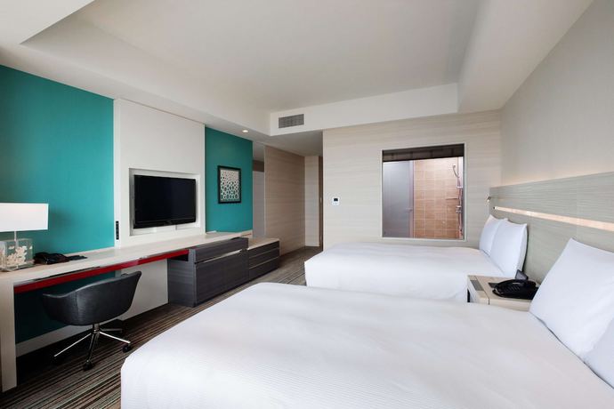 Imagen de la habitación del Hotel Hilton Okinawa Chatan Resort. Foto 7