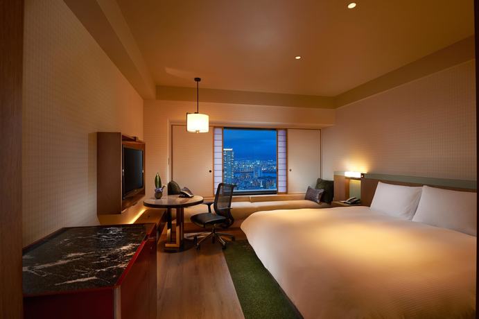 Imagen de la habitación del Hotel Hilton Osaka. Foto 9