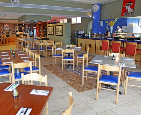 Imagen del bar/restaurante del Hotel Hilton Ponce Golf and Casino Resort. Foto 3