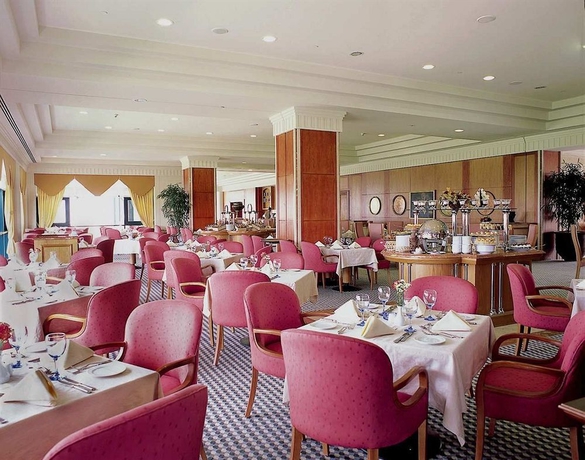 Imagen del bar/restaurante del Hotel Hilton Pyramids Golf. Foto 1