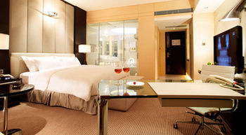 Imagen de la habitación del Hotel Hilton Shanghai City Center. Foto 2