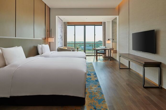 Imagen de la habitación del Hotel Hilton Shanghai Fengxian. Foto 35