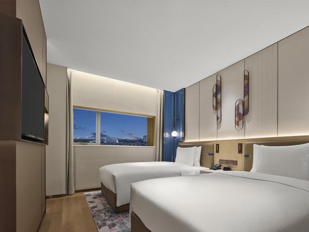 Imagen de la habitación del Hotel Hilton Shanghai Greater Hongqiao. Foto 11