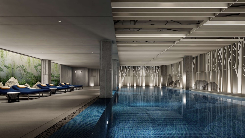 Imagen de la piscina del Hotel Hilton Shanghai Songjiang Guangfulin. Foto 19