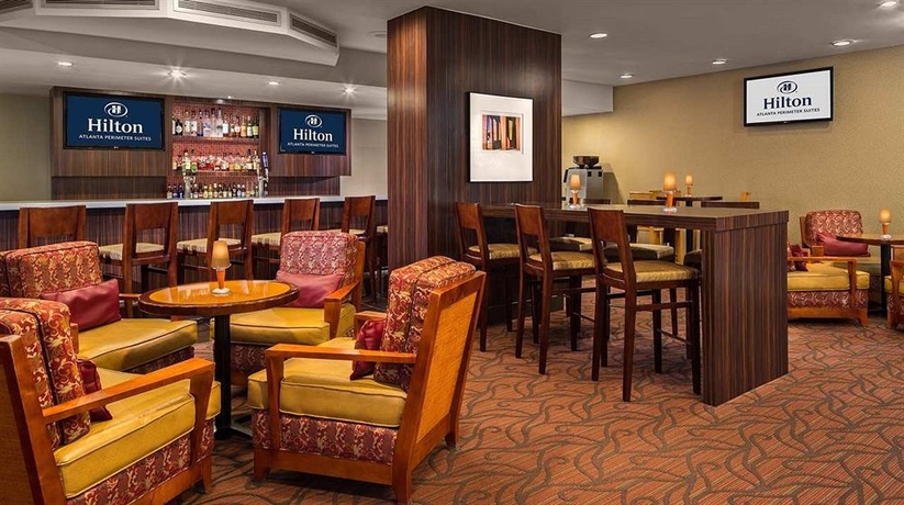 Imagen del bar/restaurante del Hotel Hilton Suites Atlanta Perimeter. Foto 2