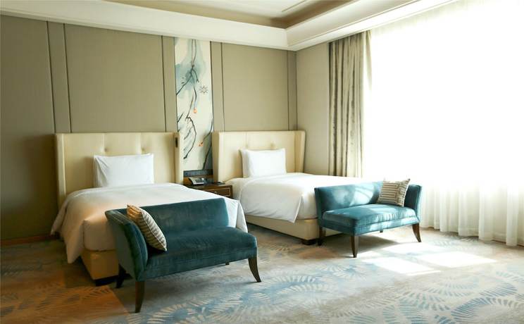 Imagen de la habitación del Hotel Hilton Urumqi. Foto 8