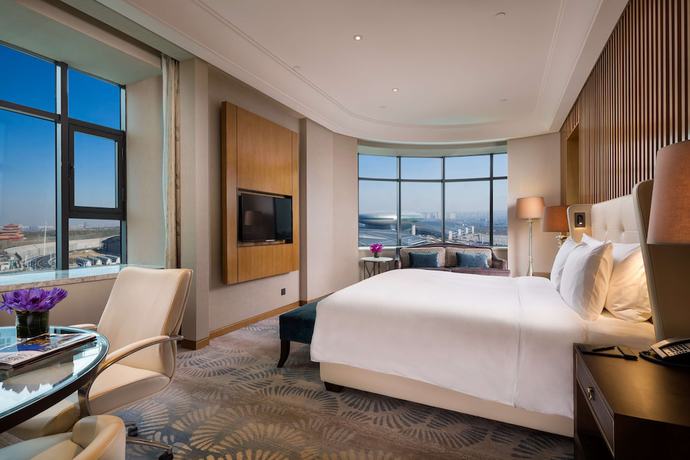 Imagen de la habitación del Hotel Hilton Urumqi. Foto 13