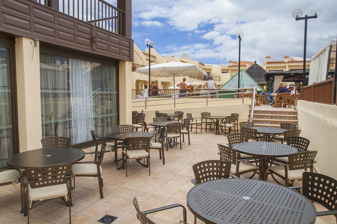 Imagen del bar/restaurante del Hotel Hilton Vacation Club Royal Sunset Beach Club Tenerife. Foto 4