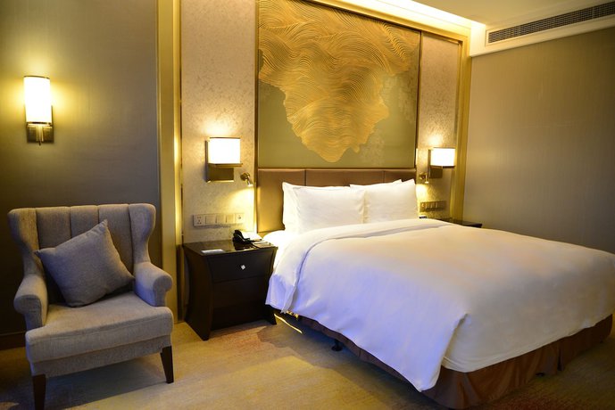 Imagen de la habitación del Hotel Hilton Yantai. Foto 3