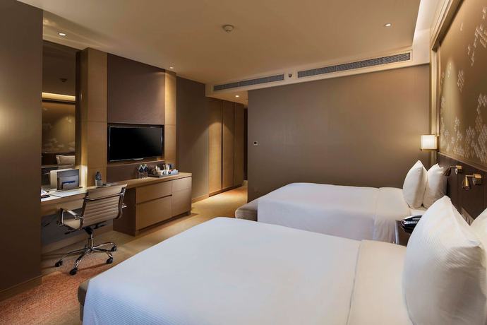 Imagen de la habitación del Hotel Hilton Yantai. Foto 8
