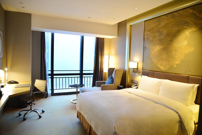 Imagen de la habitación del Hotel Hilton Yantai. Foto 9