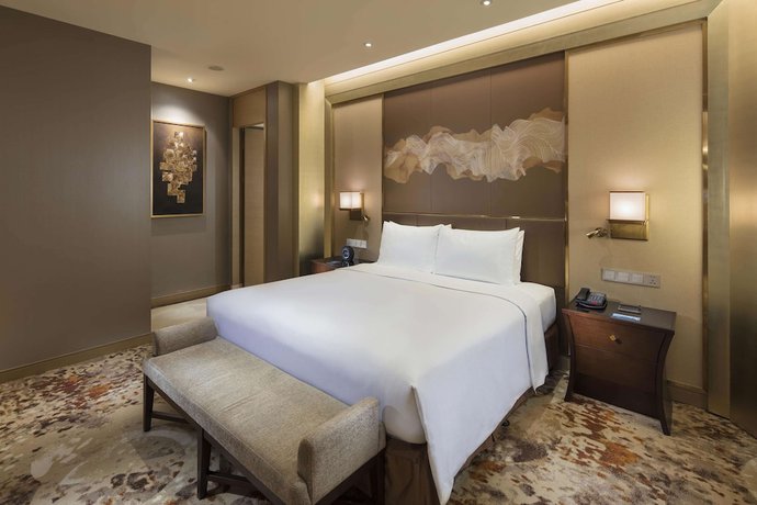 Imagen de la habitación del Hotel Hilton Yantai. Foto 10