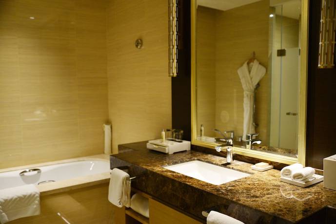 Imagen de la habitación del Hotel Hilton Yantai. Foto 14