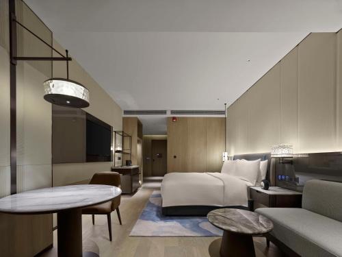 Imagen de la habitación del Hotel Hilton Yuyao. Foto 12