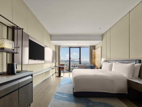 Imagen de la habitación del Hotel Hilton Yuyao. Foto 13