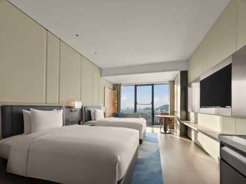 Imagen de la habitación del Hotel Hilton Yuyao. Foto 19