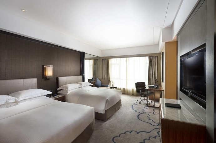 Imagen de la habitación del Hotel Hilton Zhongshan Downtown. Foto 8
