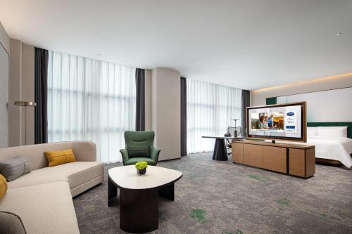 Imagen de la habitación del Hotel Hilton by Hampton Guangzhou Xintang. Foto 14